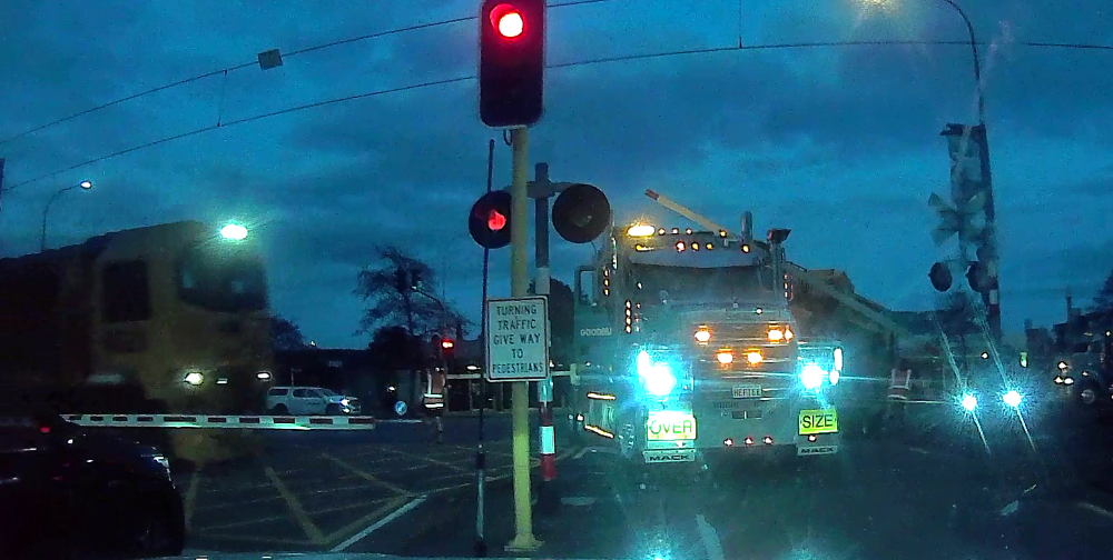 Freight train about to collide with truck on level crossing in Waikanae