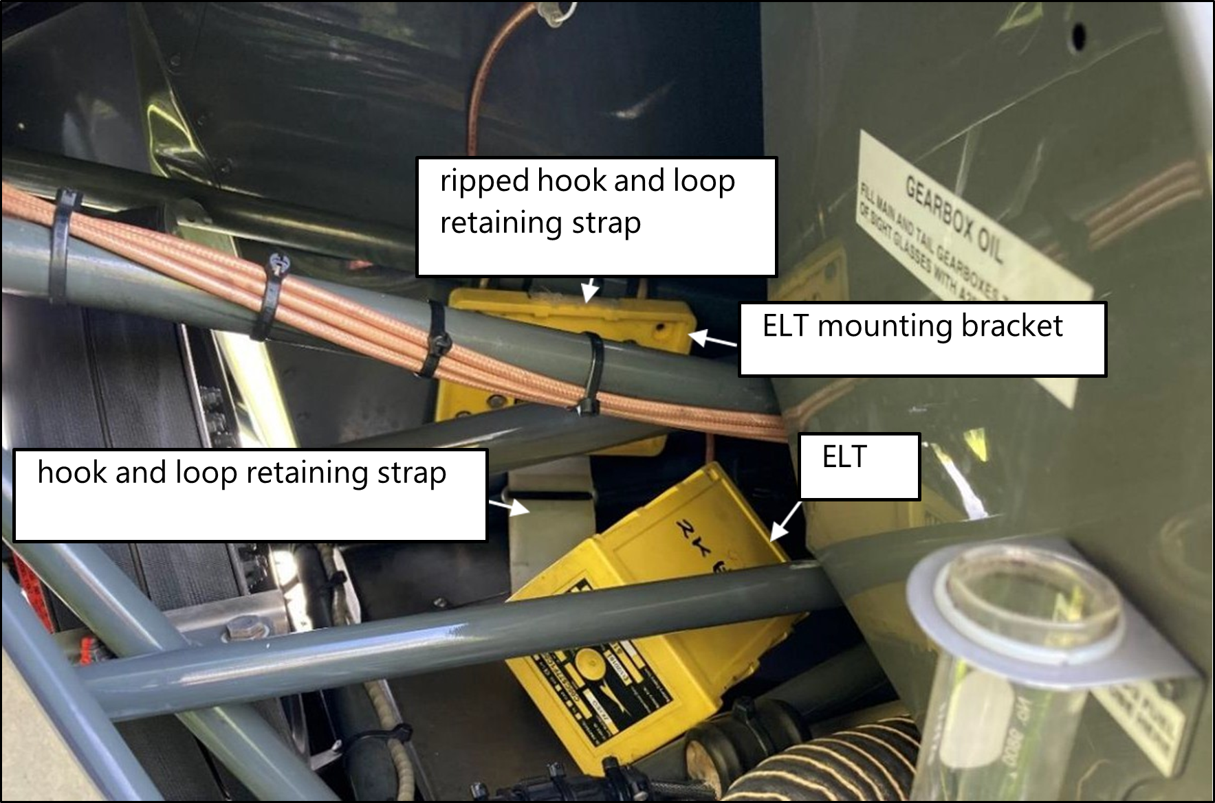 Photo of an ELT ripped retaining strap