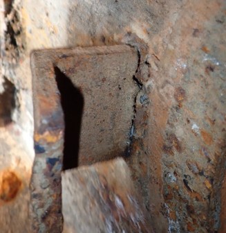 Pintle stopper in place within lower casting