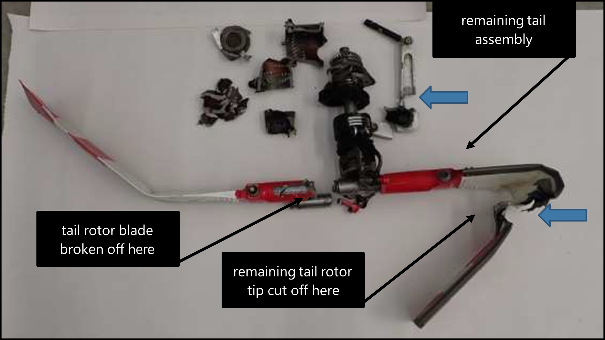 Figure 9: Tail rotor assembly showing main rotor blade impacts (blue arrows)