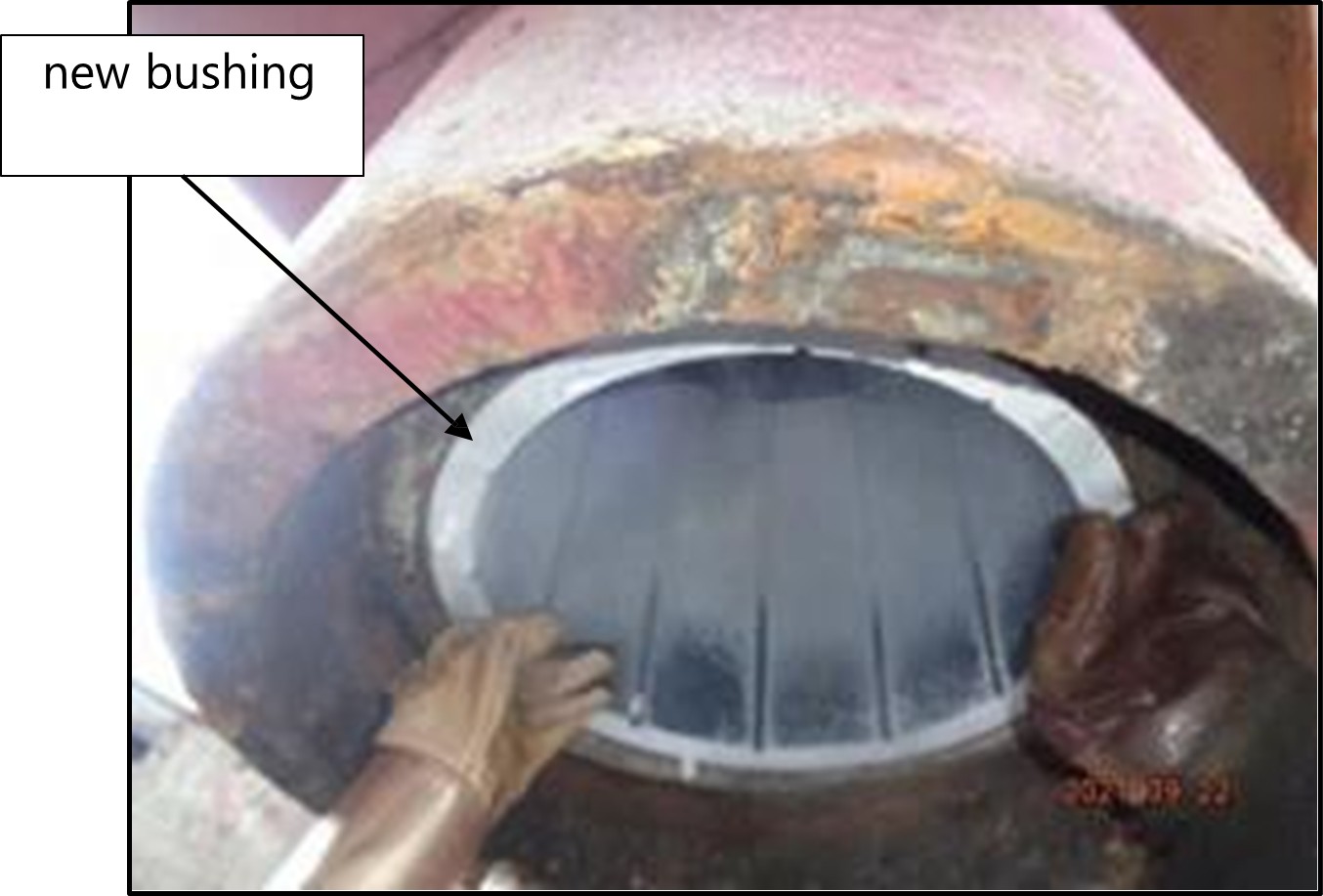 Photo of the pintle removed, new bushing installed (viewed from below the gudgeon) 