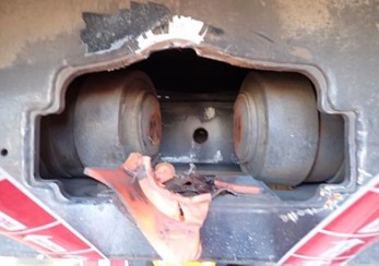 Rear of carriage one showing coupler drawgear location and damaged chassis