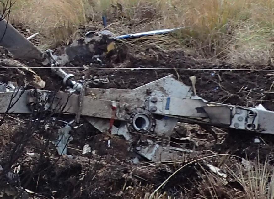 Photo of the main rotor hub with tail rotor in background