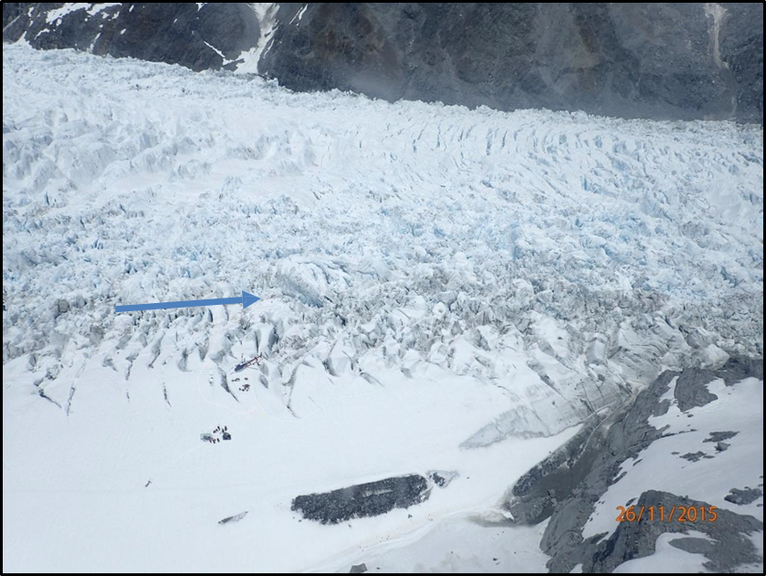 Overview of site (taken during recovery operations). Taken abeam the edge of Chancellor Shelf, and showing likely direction at impact