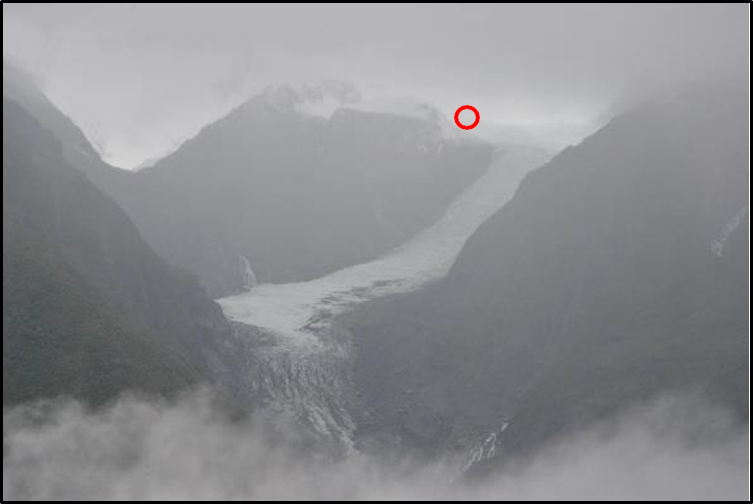 Weather&nbsp;when&nbsp;flying&nbsp;up&nbsp;Fox&nbsp;Glacier. Chancellor&nbsp;Shelf&nbsp;is&nbsp;in&nbsp;the&nbsp;direction&nbsp;of&nbsp;the&nbsp;circle