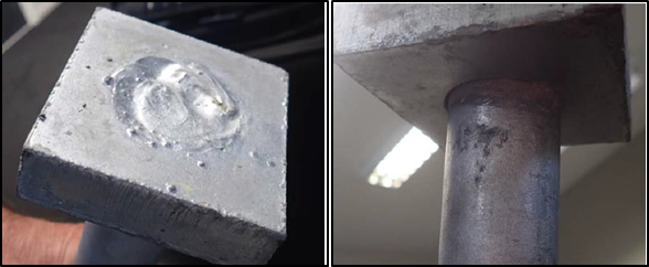 The top (left) and bottom (right) welded bolt head plates, same design used to secure bollard 26
