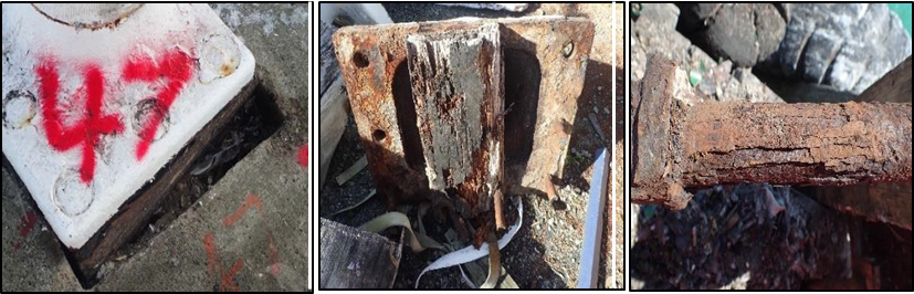 Decaying timber and corroded bolts supporting bollards 47 (left) and 46 (centre and right)
