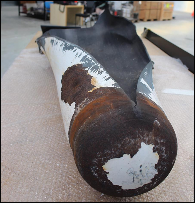 Area of corrosion near the bottom of the failed cylinder