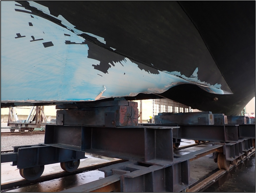 Damage to hull on the starboard side