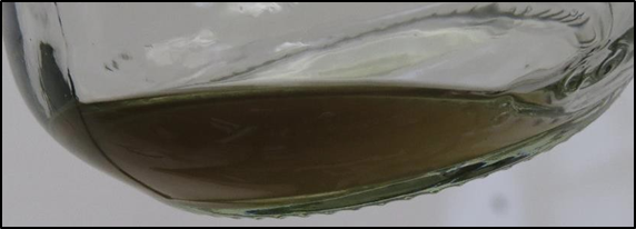 Discoloured sample from fuel hose assembly