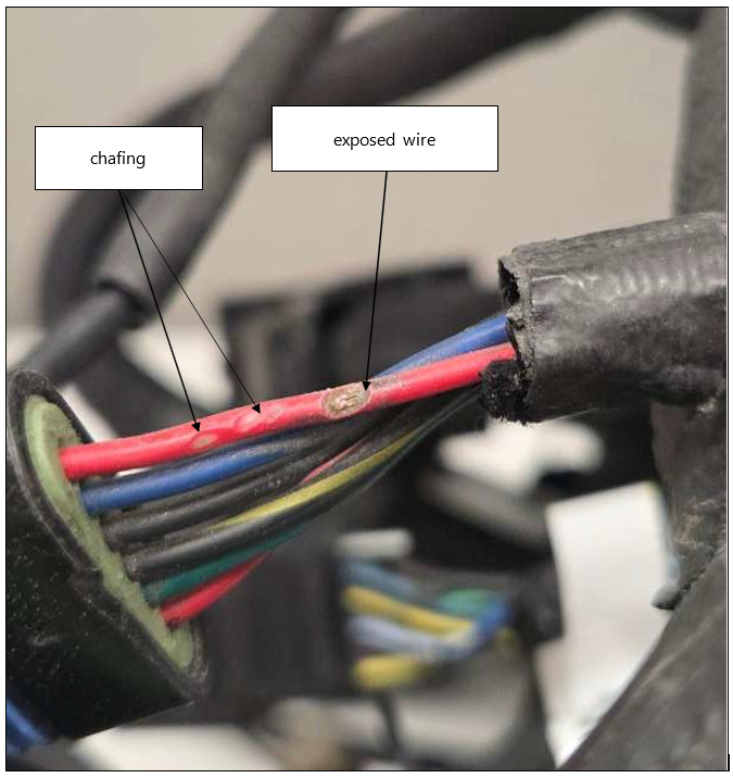 The pedal position sensor lead showing signs of chafing where the wire is exposed