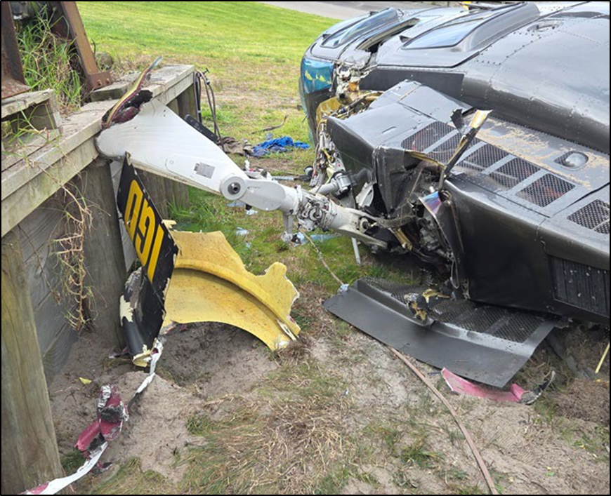Top of helicopter and remains of the main rotor blades