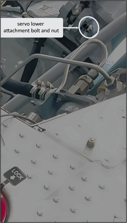 Figure 7: ZK-HJM lower attachment bolt and nut during maintenance (Credit: Engineer A, marked up by TAIC)