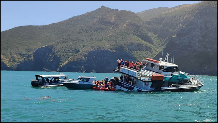 Figure 8: Evacuation of passengers from the Black Cat (Credit: TVNZ (via RNZ) taken by a witness)