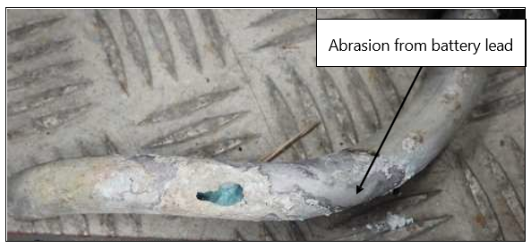 Abrasion from battery lead