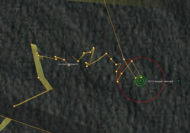 Close up of helicopter flight path hovering over EPIRB encoded position (green dot). Red circle indicates the 61-metre accuracy around the EPIRB encoded position at 0013
