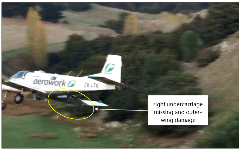 Undercarriage missing and right-hand-wing damage