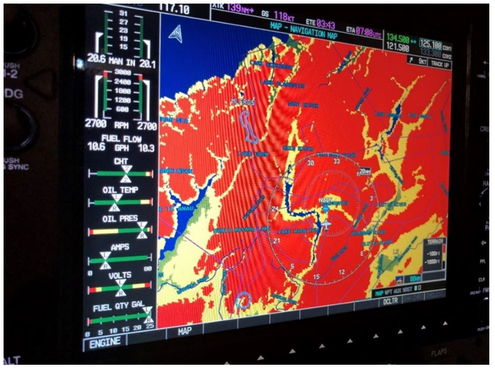The G1000 multifunctional display moving map, showing a graphical presentation of the terrain-conflict-proximity function