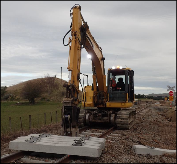 Re-enactment of hi-rail excavator and sleeper position on track