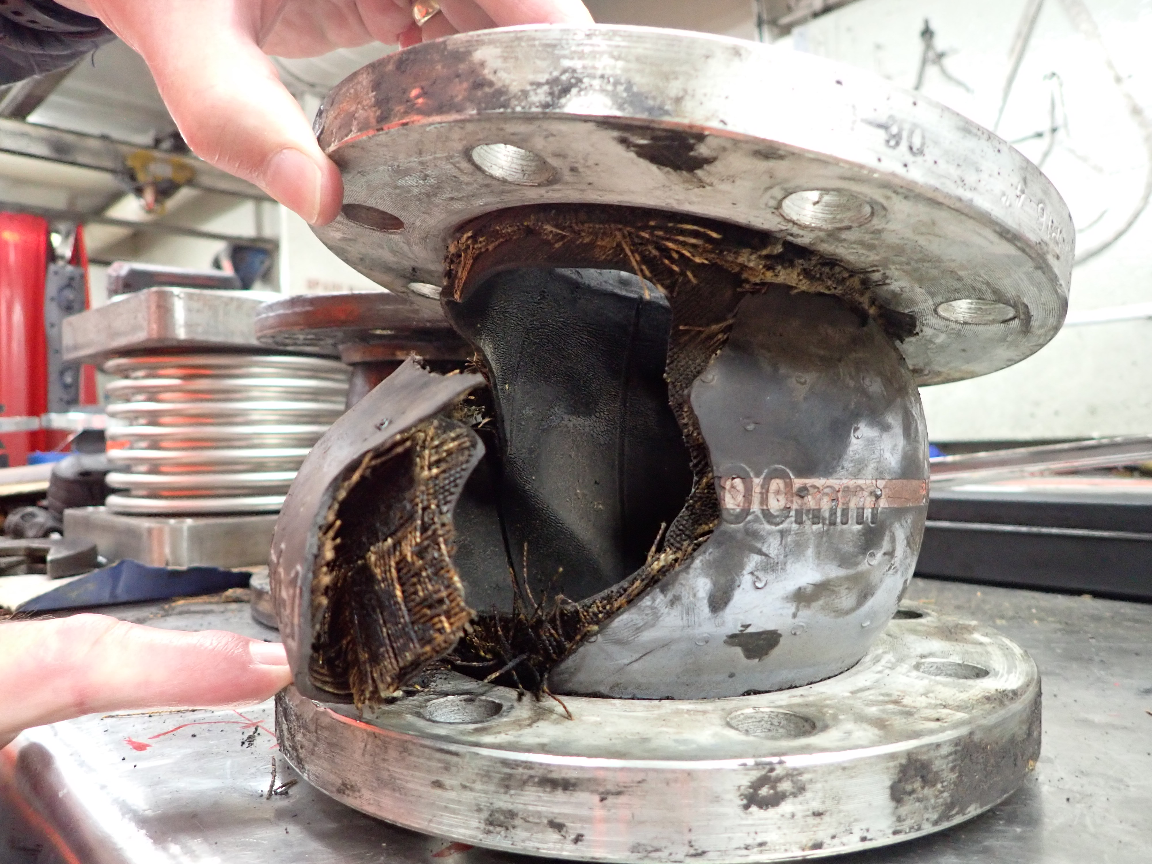 The ruptured rubber expansion joint. TAIC photo